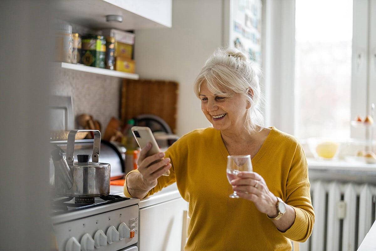 old-woman-checking-medicins-on-mobile