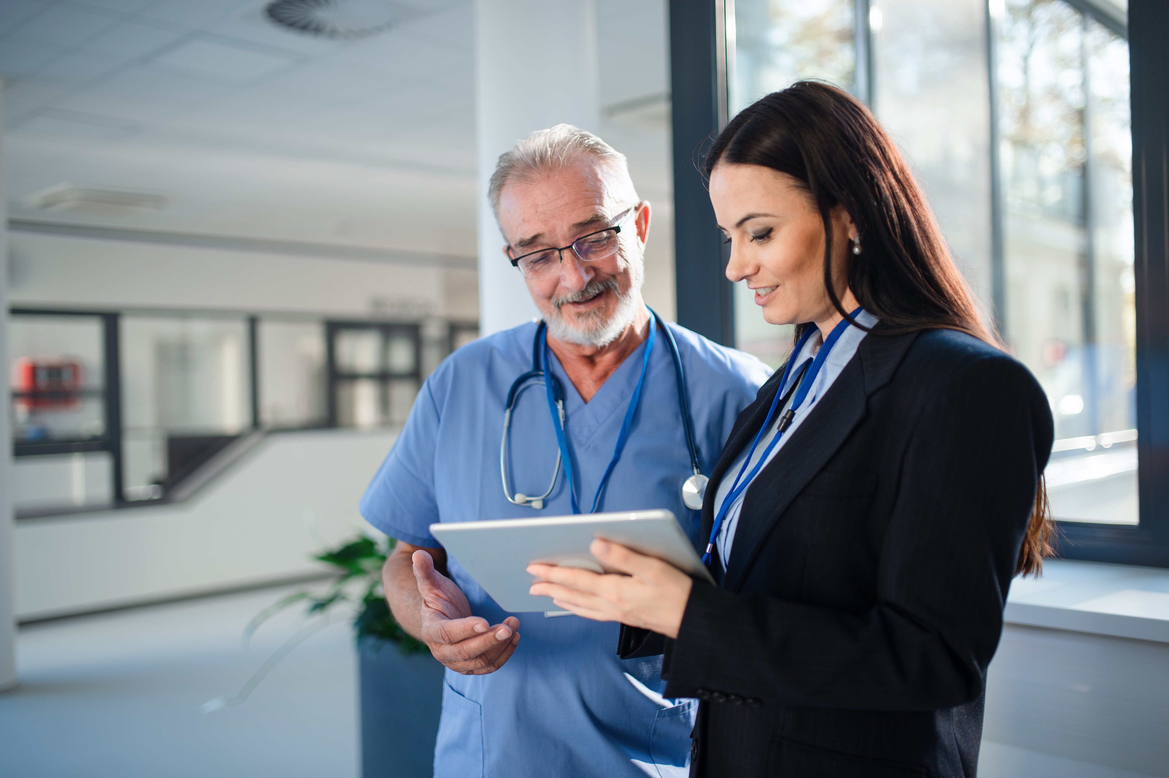 doctor-and-manager-checking-data